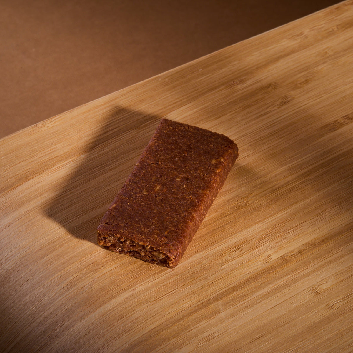Cookie Dough Bar Raspberry on a wooden board