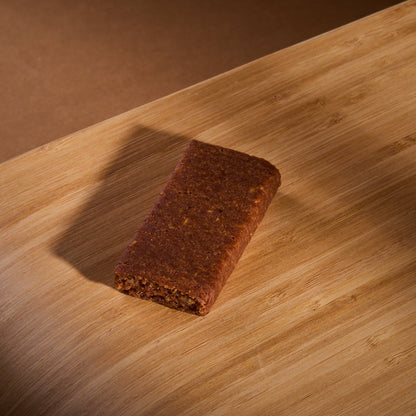 Cookie Dough Bar Raspberry on a wooden board