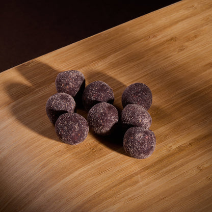 Fruit Balls Blueberry on a wooden board