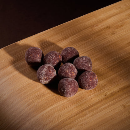 Fruit Balls Mango on a wooden board