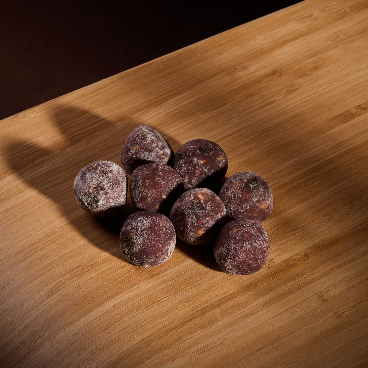 Fruit Balls Raspberry on a wooden board